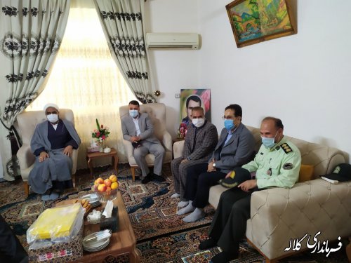 فرماندار کلاله با خانواده‌ شهید بارانی و کارمند جانباز در شهر کلاله دیدار کرد